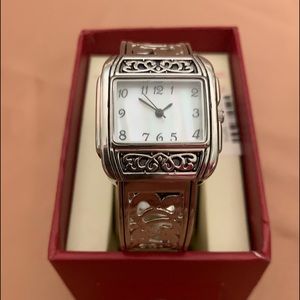 Silver tone bangle watch